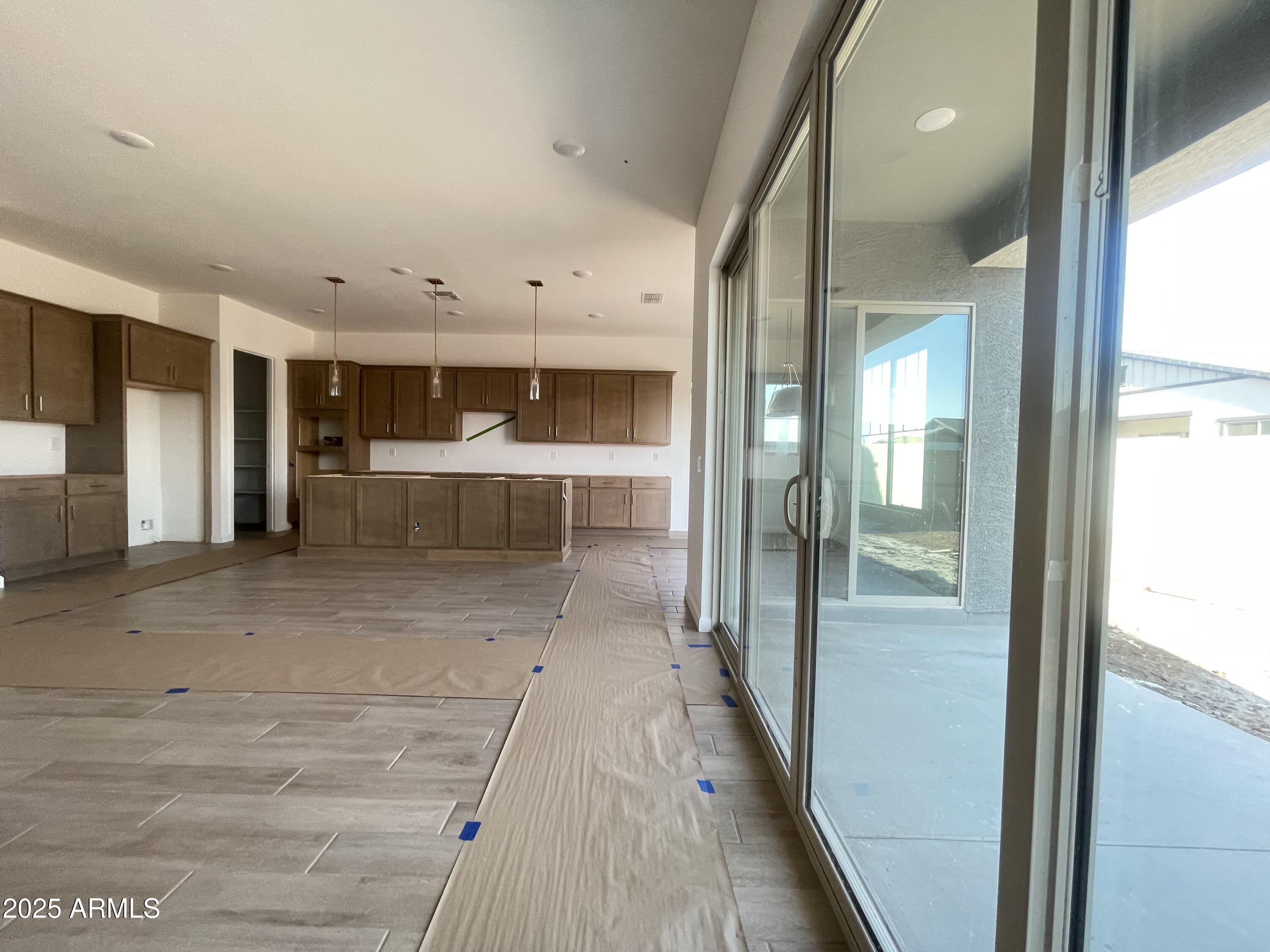22669 East Saddle Way Queen Creek, AZ 85142 - Photo 28 of 46 027 greatroom kitchen