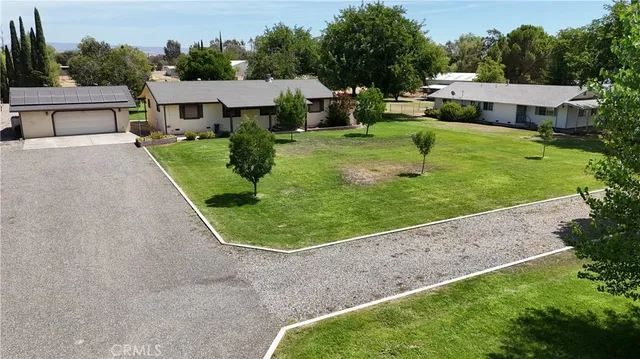 a house view with garden space