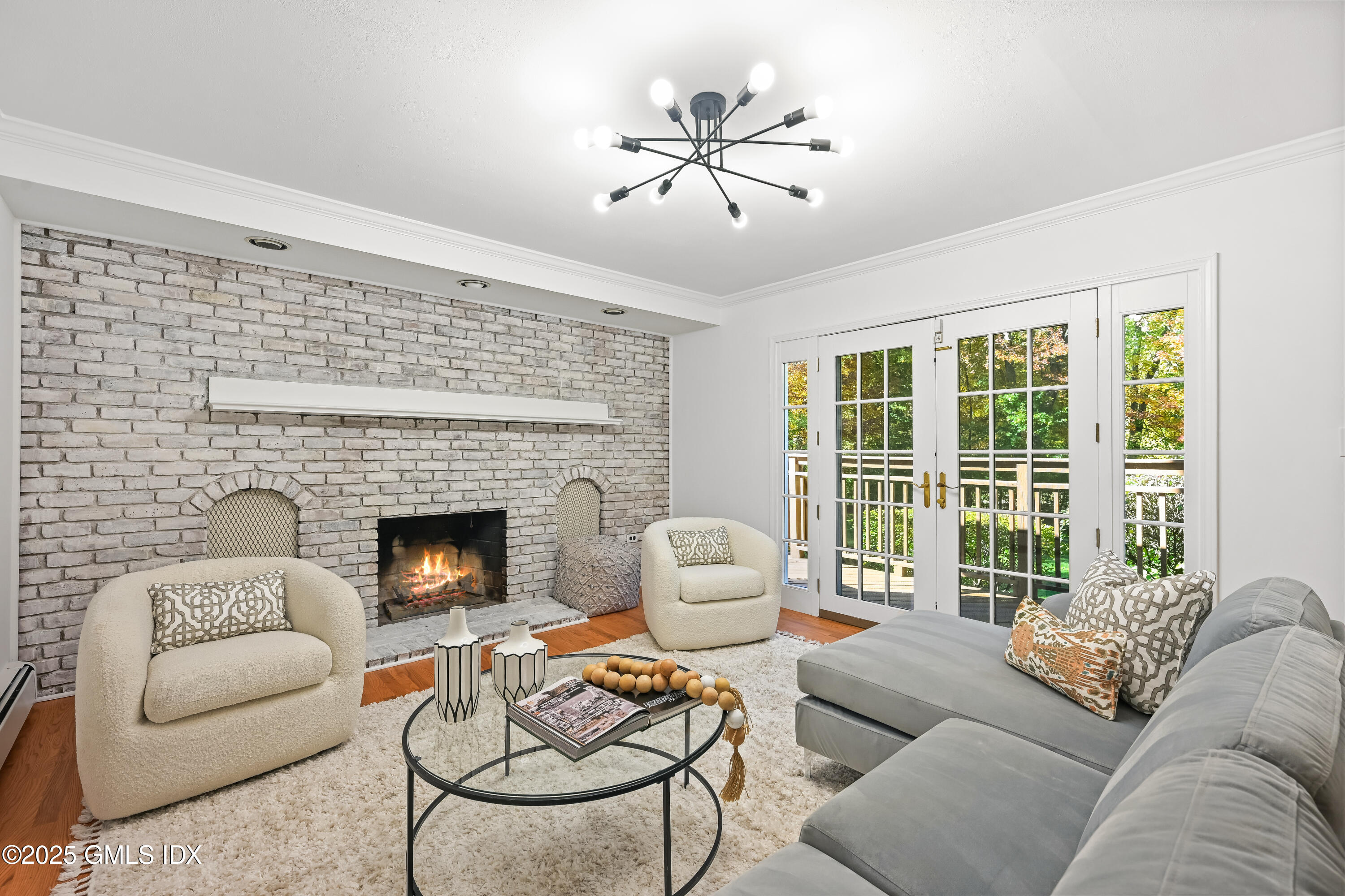 38 Bedford Road Greenwich, CT 06831 - Photo 13 of 32 a living room with furniture and a fireplace