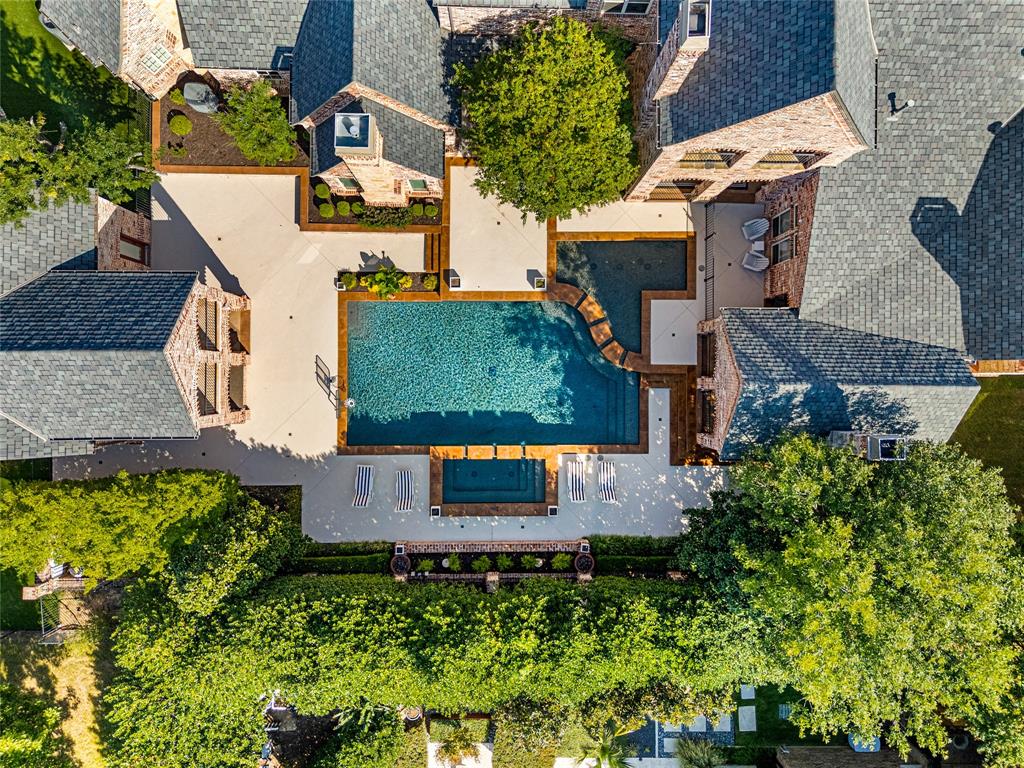 6900 Rockingham Court Colleyville, TX 76034 - Photo 40 of 40 Expansive outdoor living area featuring a large swimming pool with integrated spa