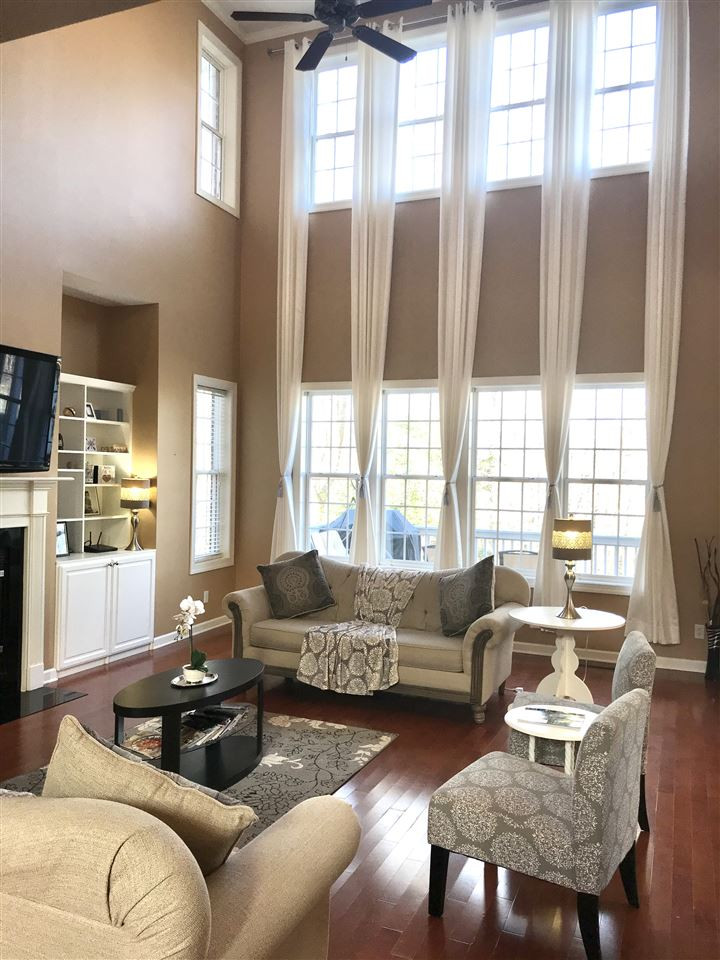2913 Elmfield Street Raleigh, NC 27614 - Photo 5 of 30 Sunken Living Room with Two-Story Ceilings, Fireplace, and Built-Ins. Living Room