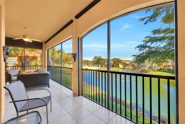 a view of a chairs and table in patio