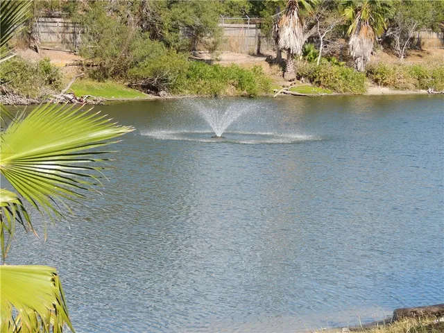 a view of a lake from a balcony
