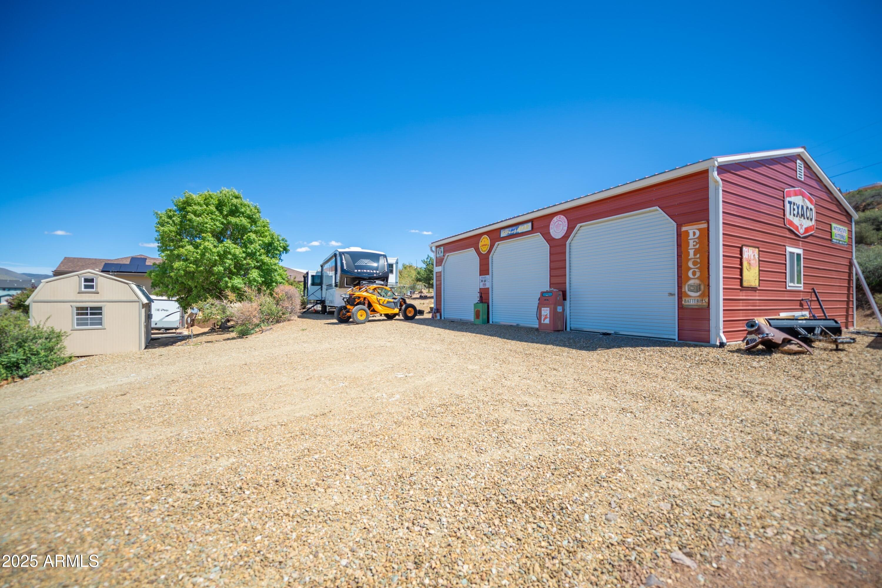 171 South Enchanted Road Dewey, AZ 86327 - Photo 45 of 62 a view of a house with a yard
