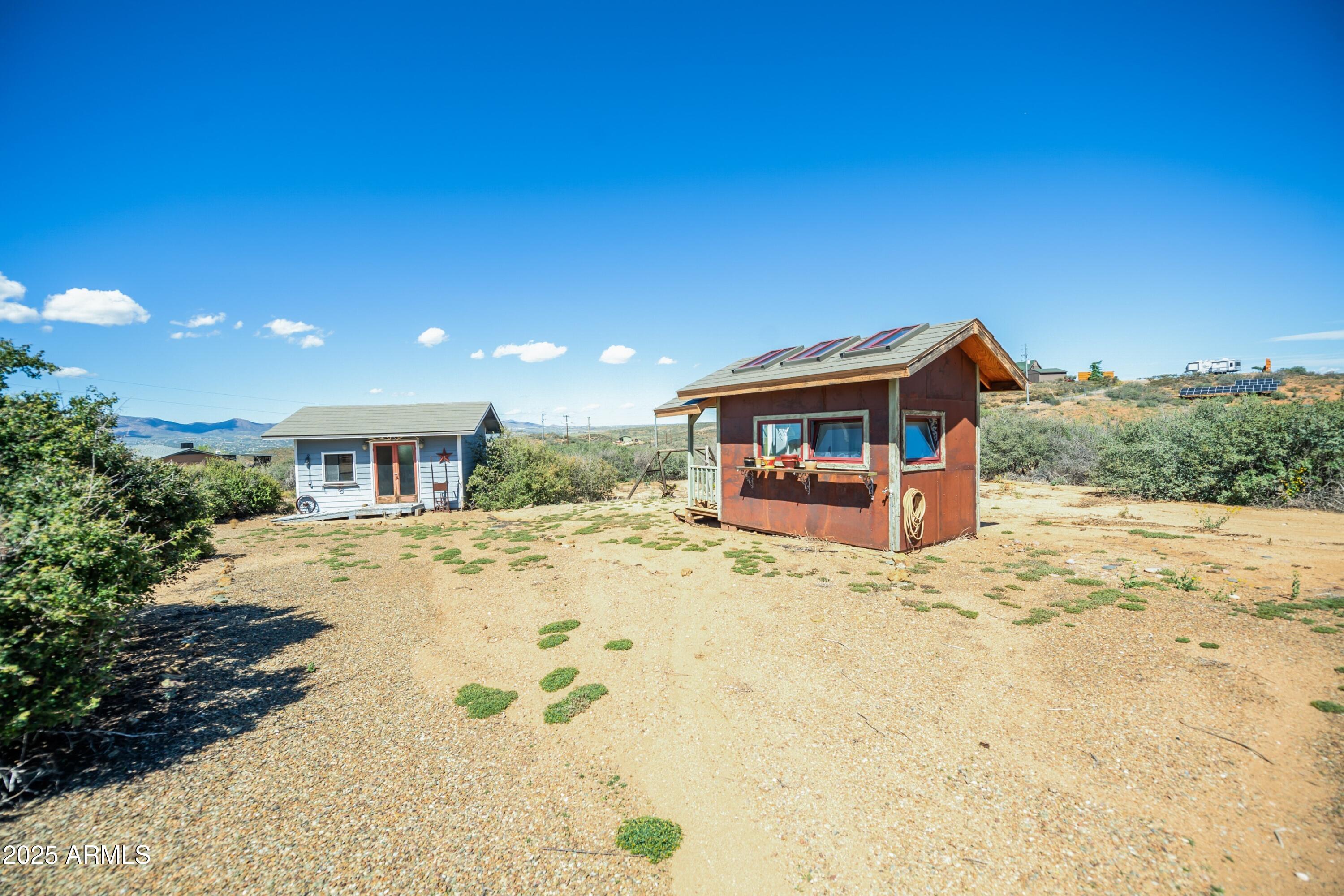 171 South Enchanted Road Dewey, AZ 86327 - Photo 62 of 62 a view of a house with a snow in the yard