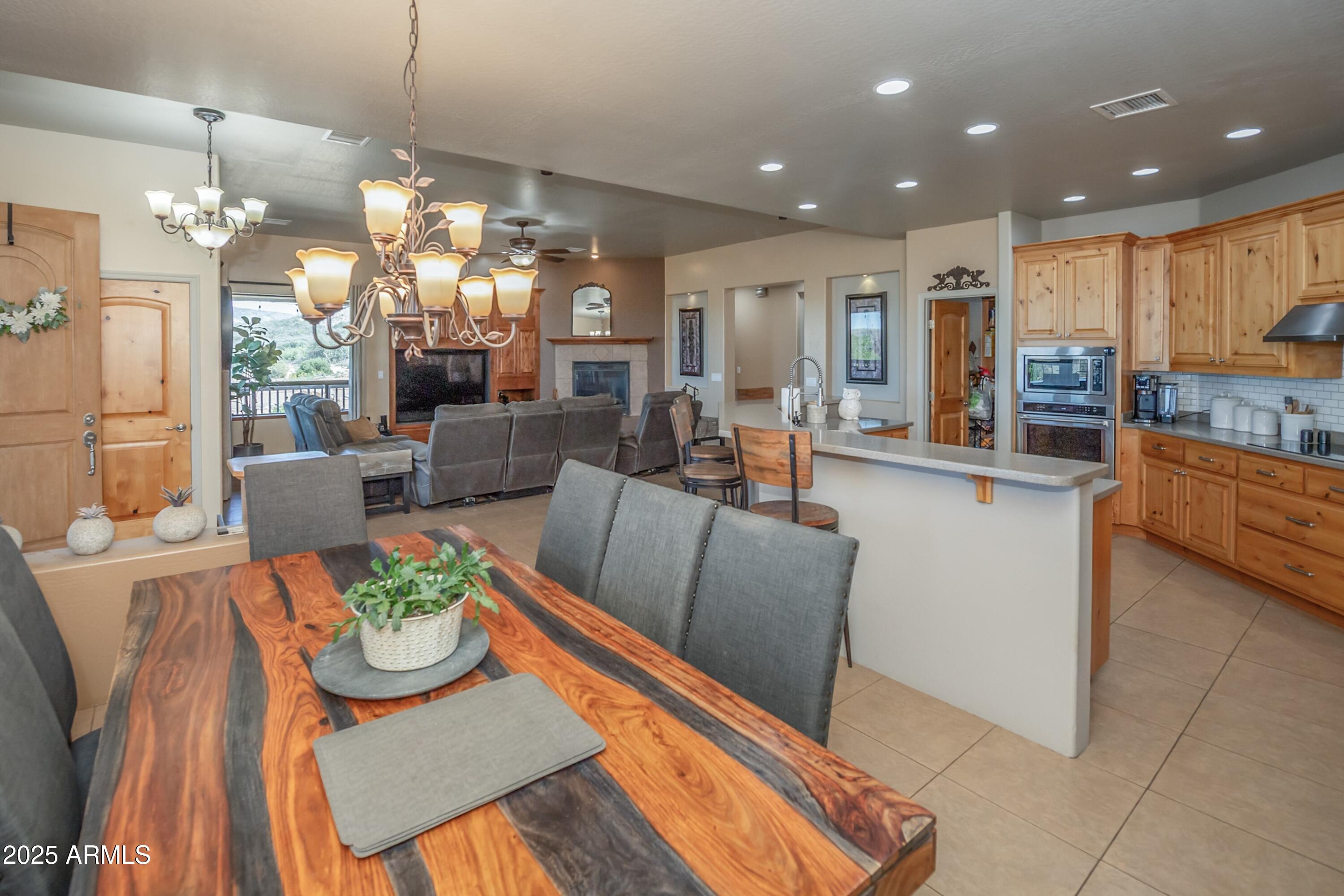 171 South Enchanted Road Dewey, AZ 86327 - Photo 8 of 62 a view of a dining room with furniture