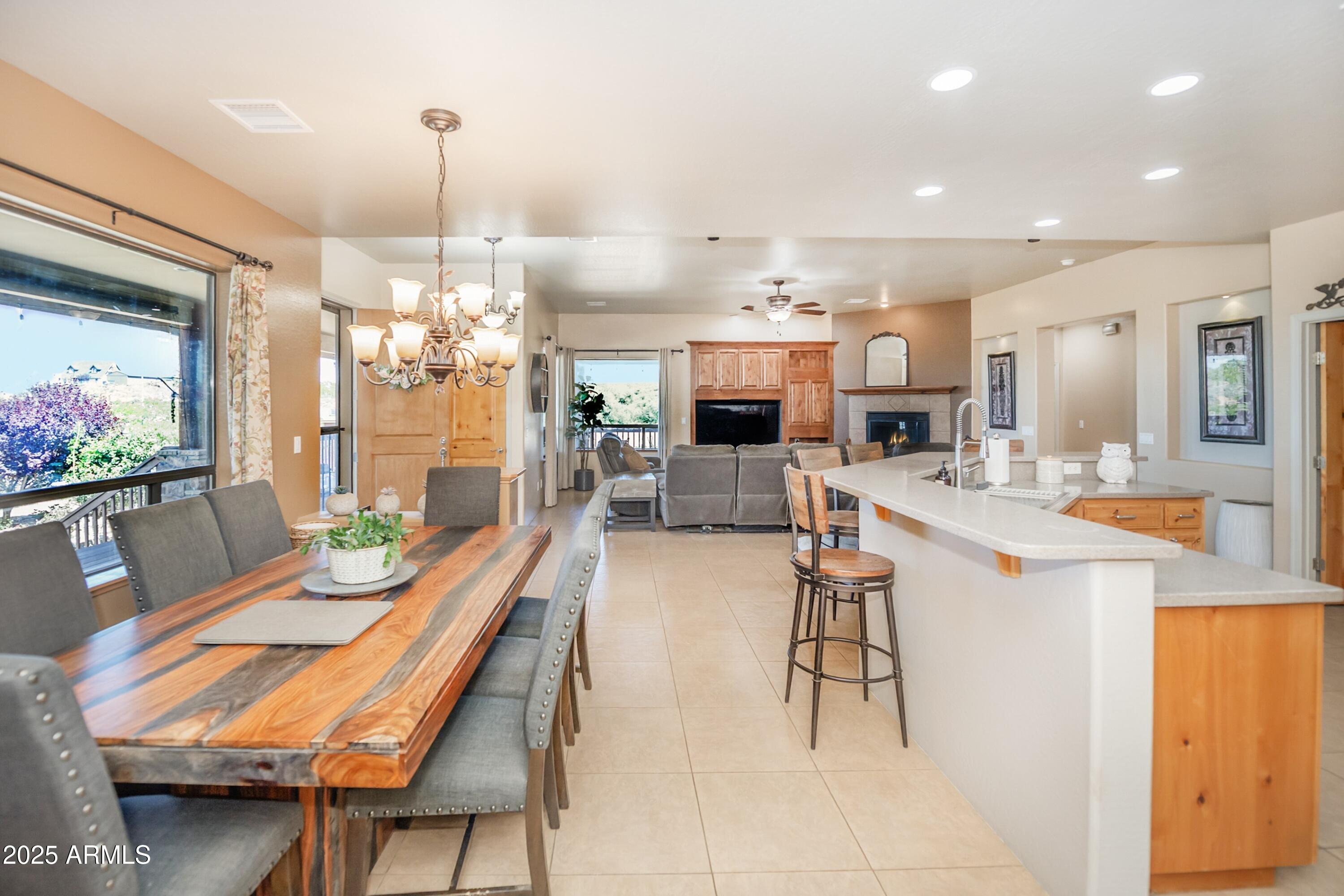 171 South Enchanted Road Dewey, AZ 86327 - Photo 9 of 62 a view of a dining room kitchen and a window