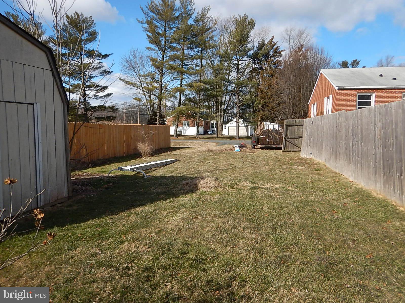 2311 Mills Road Fallston, MD 21047 - Photo 6 of 17 Side yard and storage shed to the left