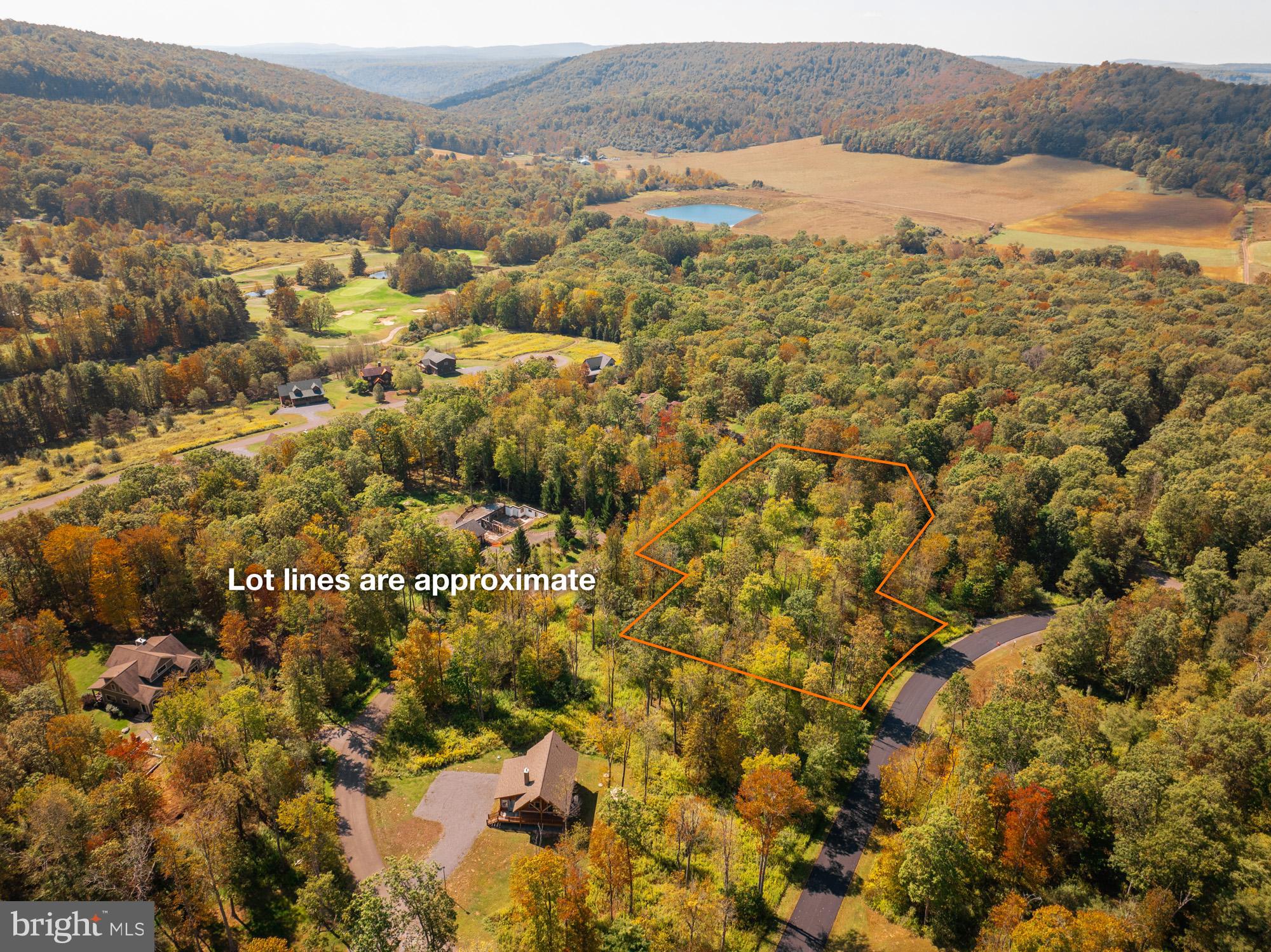 31 Hailees Lane McHenry, MD 21541 - Photo 5 of 14 an aerial view of residential houses with outdoor space and fog