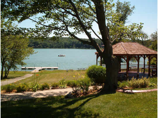 1644 Larchmont Road Lake Summerset, IL 61019 - Photo 4 of 10 a view of a swimming pool with lawn chairs and a yard