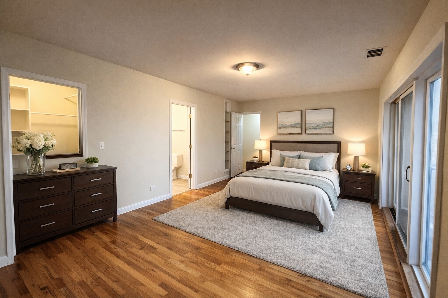 3336 West 19th Street, Unit 1W Chicago, IL 60623 - Photo 5 of 10 a bedroom with a bed and a window