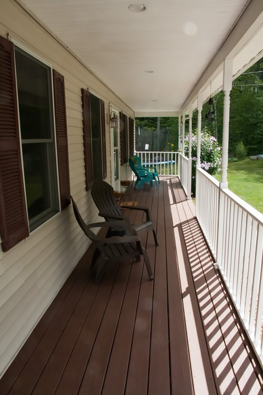 70 Bacon Road Ware, MA 01082 - Photo 8 of 30 a view of balcony with wooden floor and outdoor seating
