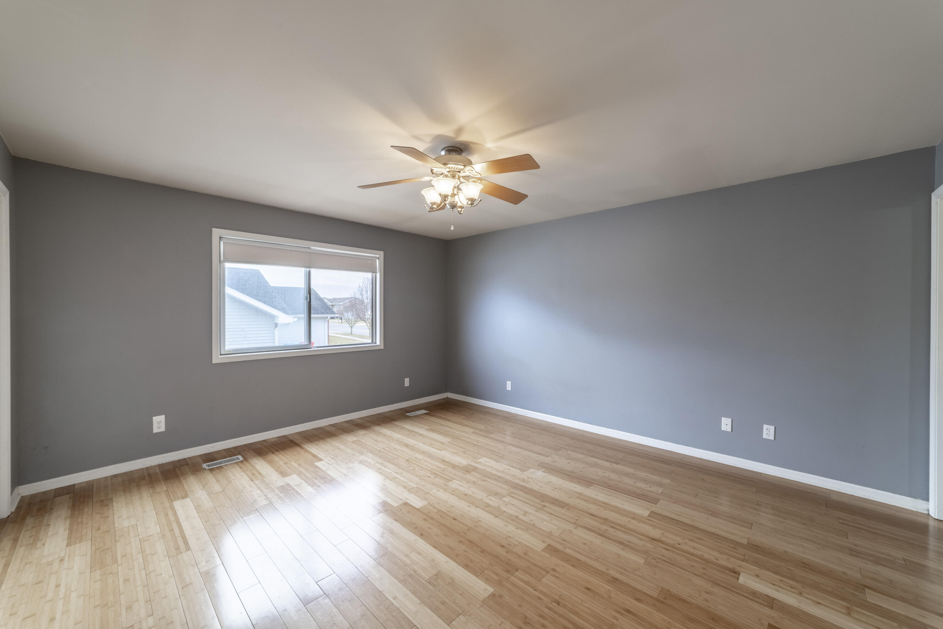 12719 Wheeler Street Cedar Lake, IN 46303 - Photo 16 of 48 an empty room with a window and a fan