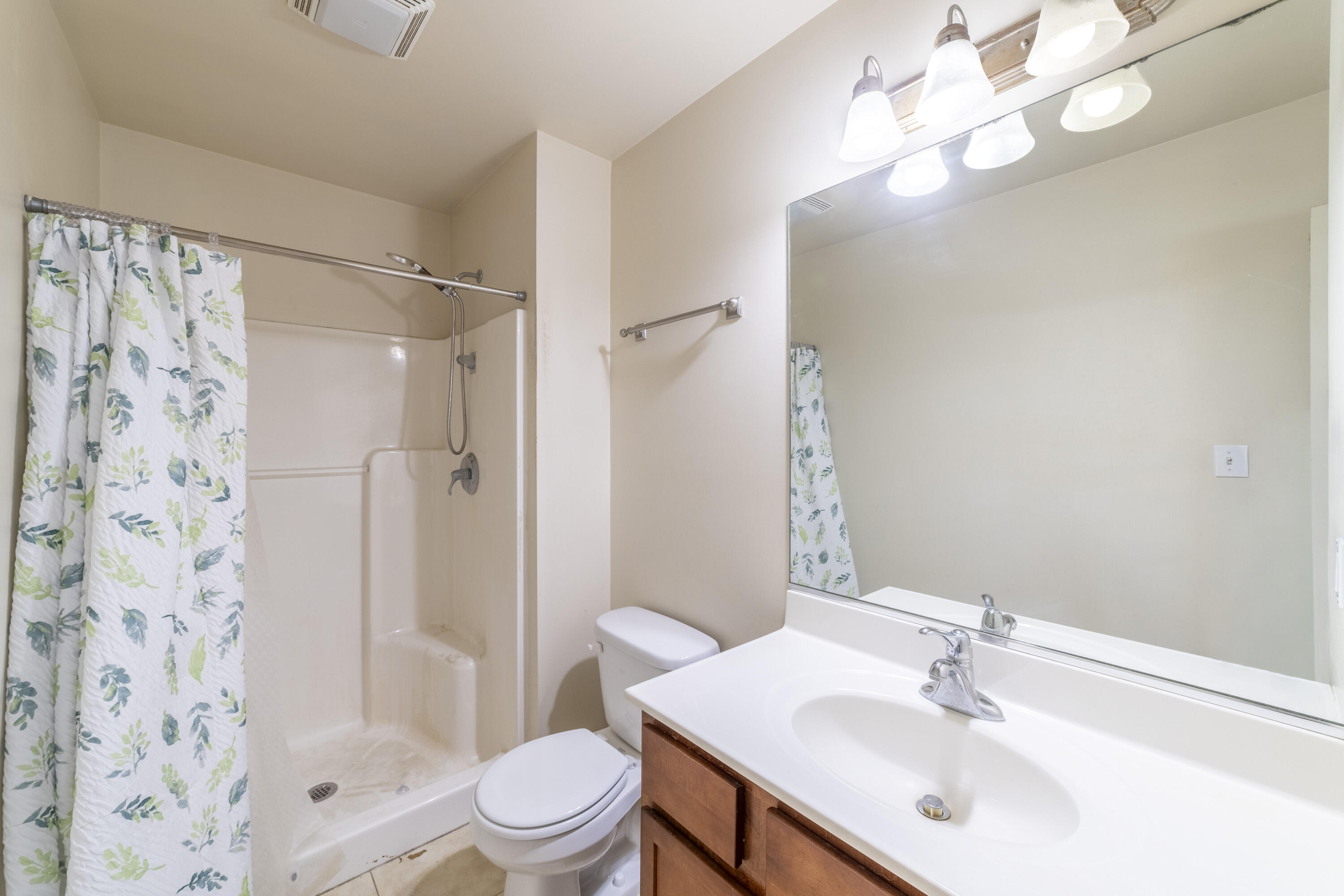 12719 Wheeler Street Cedar Lake, IN 46303 - Photo 21 of 48 a bathroom with a sink toilet tub and shower