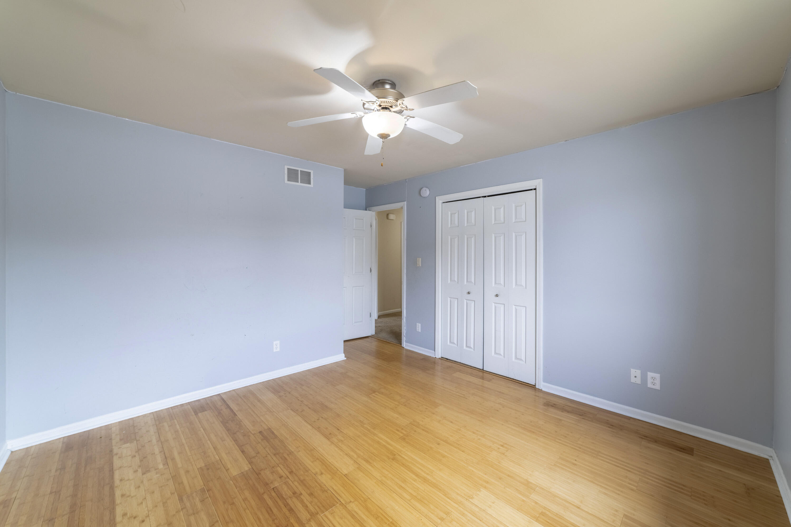 12719 Wheeler Street Cedar Lake, IN 46303 - Photo 25 of 48 a view of a room with a ceiling fan and hardwood floor