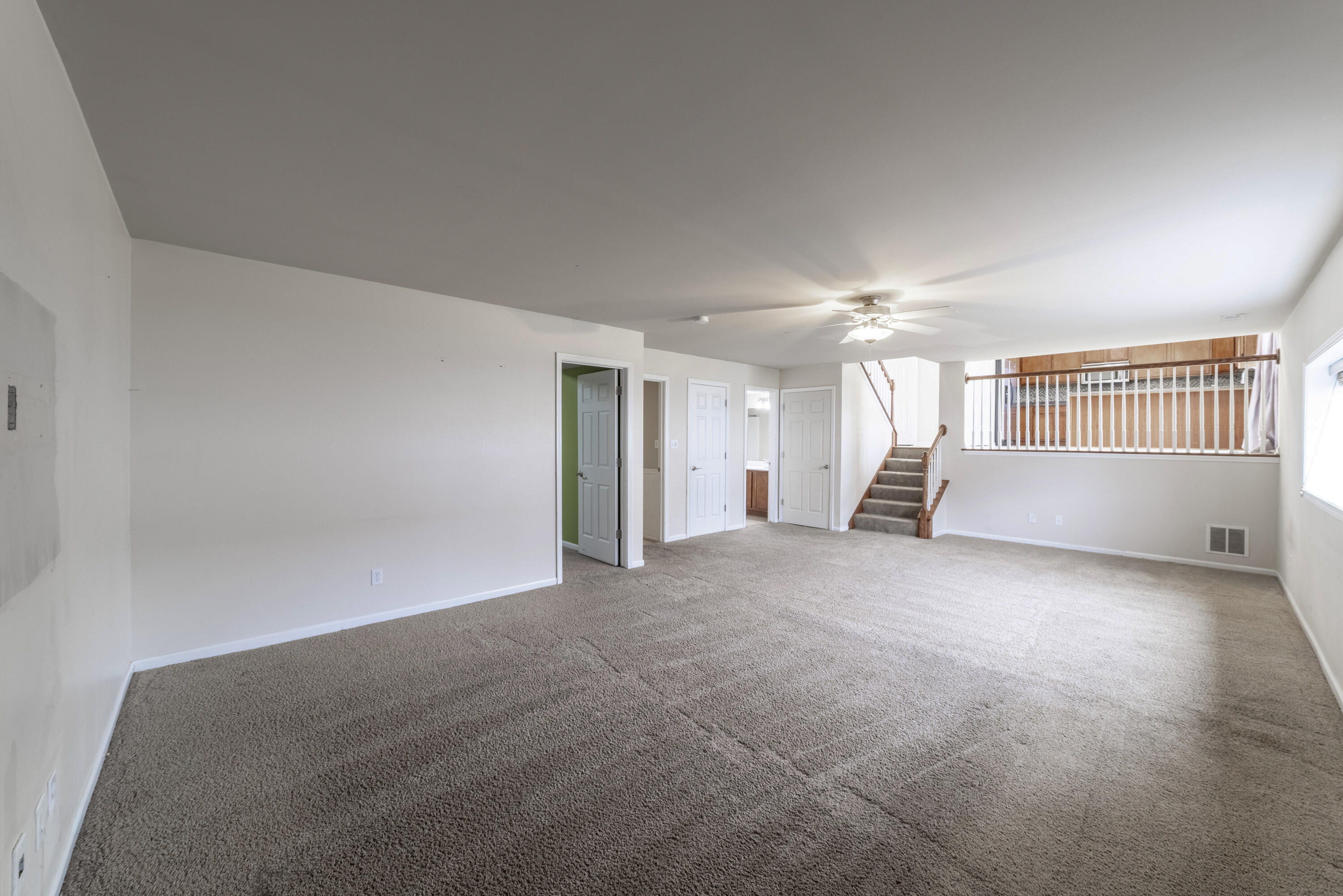 12719 Wheeler Street Cedar Lake, IN 46303 - Photo 27 of 48 a view of a livingroom with a staircase