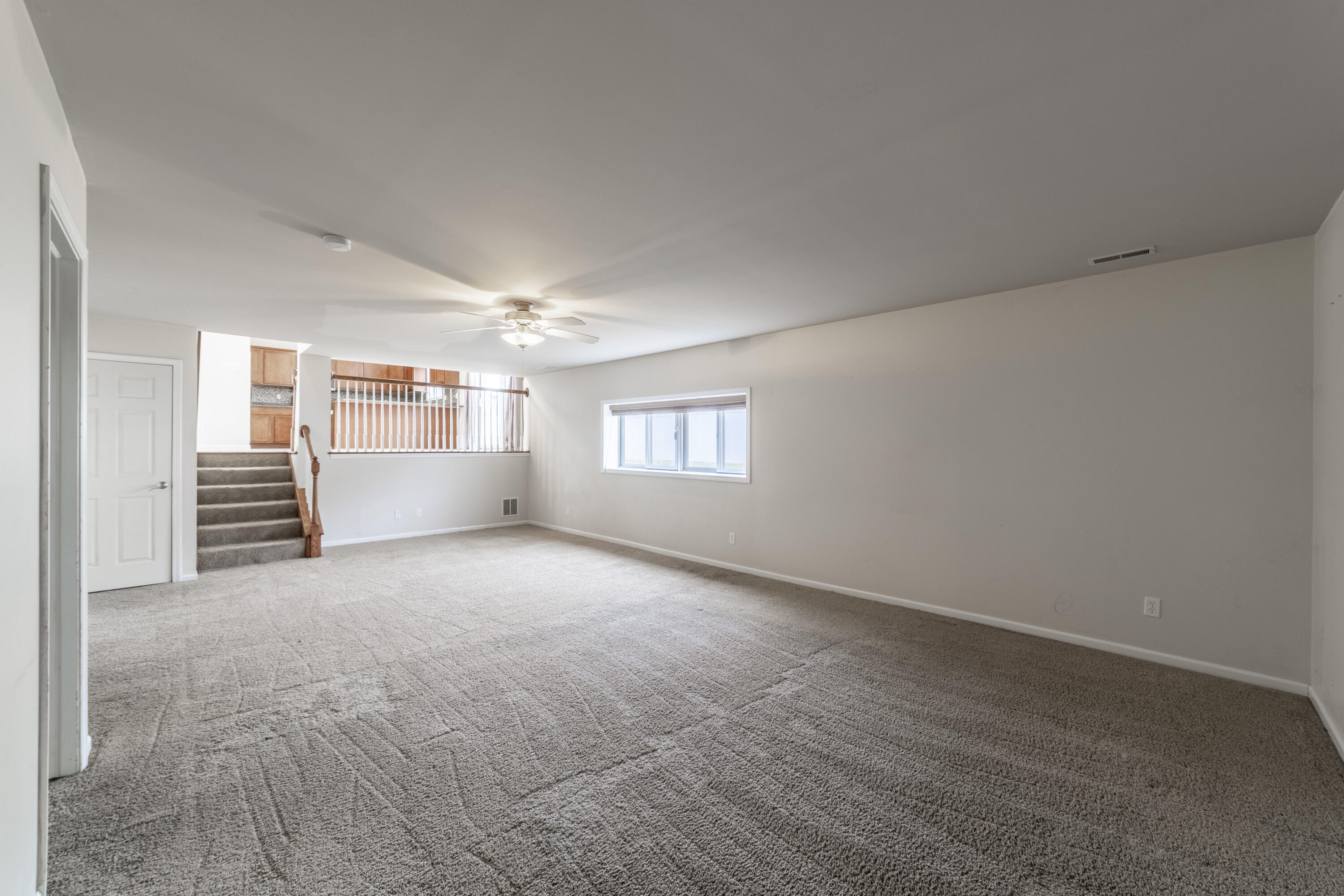 12719 Wheeler Street Cedar Lake, IN 46303 - Photo 28 of 48 a view of an empty room with a window and fireplace