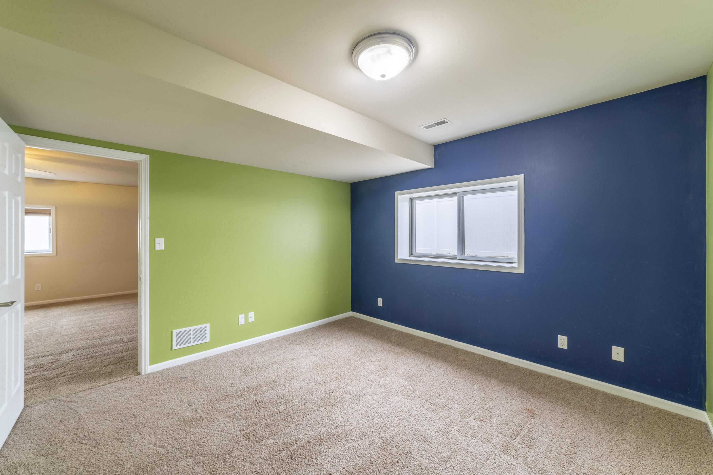 12719 Wheeler Street Cedar Lake, IN 46303 - Photo 32 of 48 an empty room with windows and closet