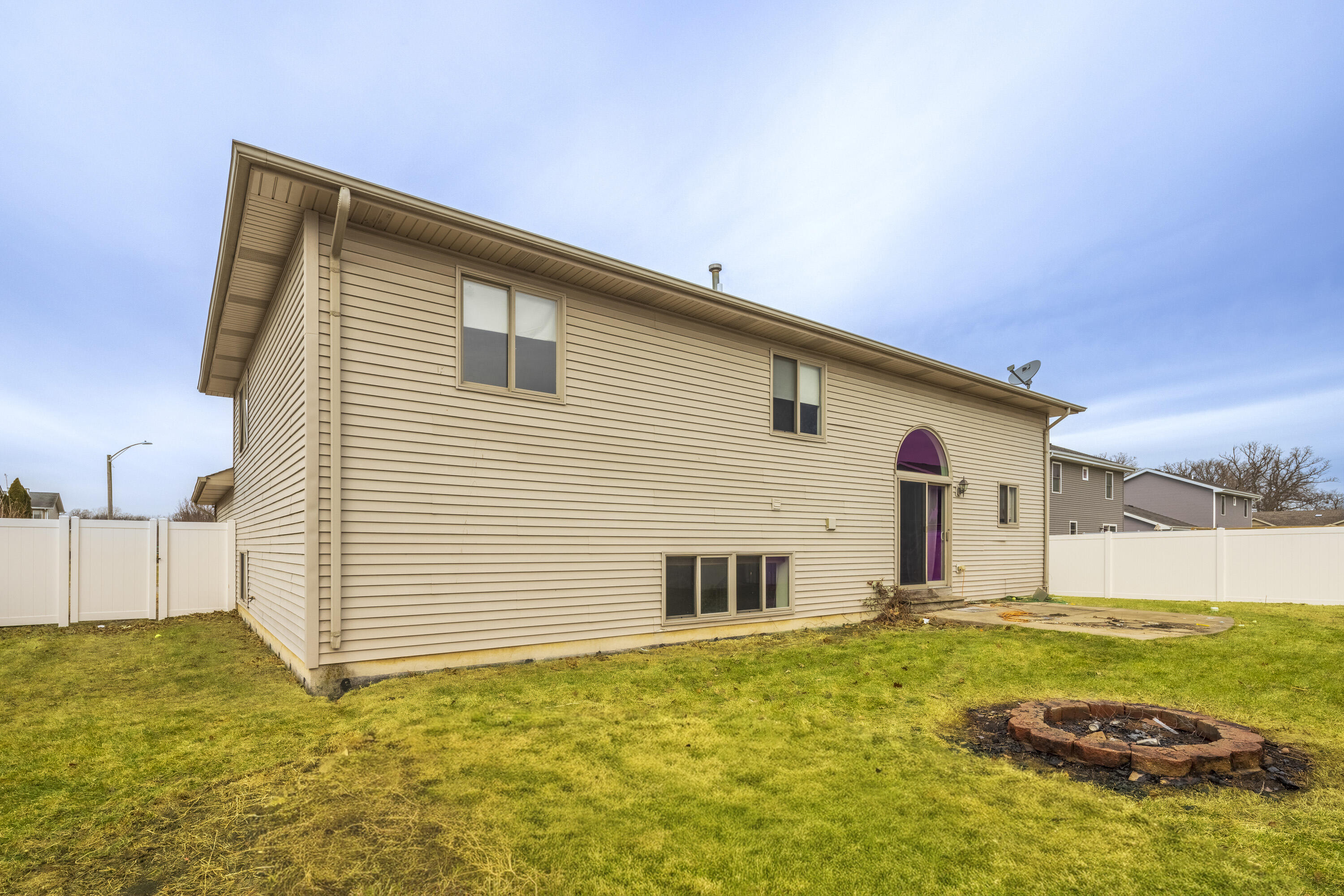 12719 Wheeler Street Cedar Lake, IN 46303 - Photo 41 of 48 a view of a house with a backyard