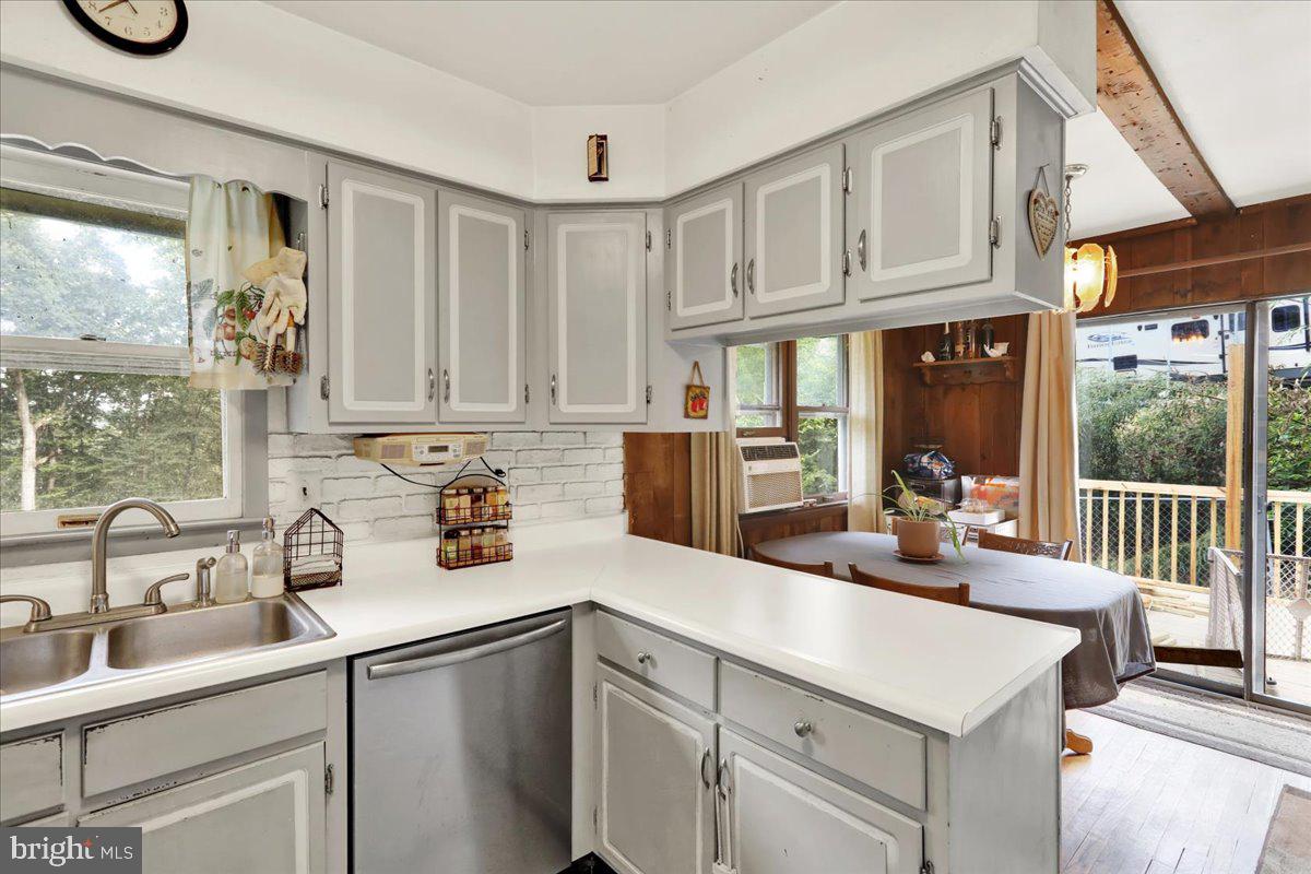 83 Preston Road Reading, PA 19608 - Photo 8 of 26 a kitchen with stainless steel appliances a sink a stove and cabinets
