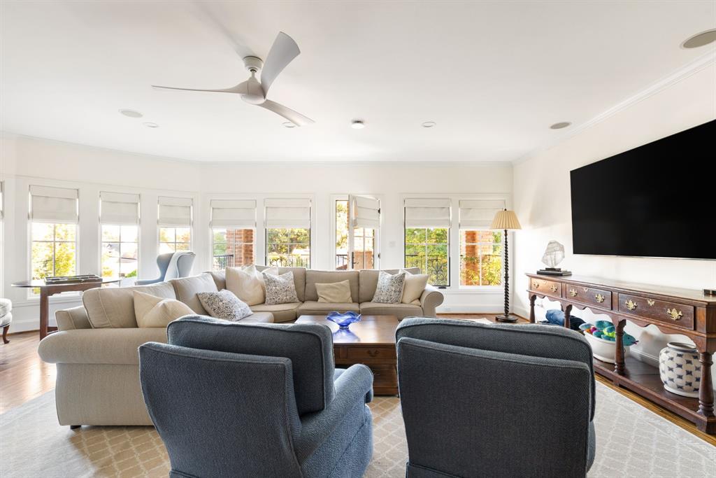 7130 Brookcove Lane Dallas, TX 75214 - Photo 23 of 40 a living room with furniture and a flat screen tv