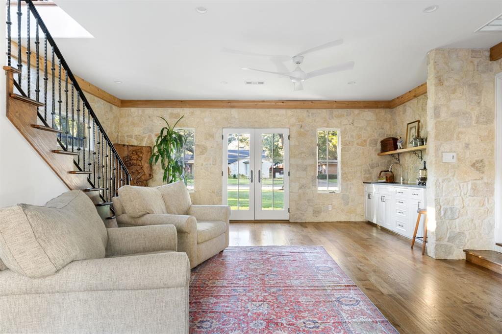 7130 Brookcove Lane Dallas, TX 75214 - Photo 34 of 40 a living room with furniture and a large window