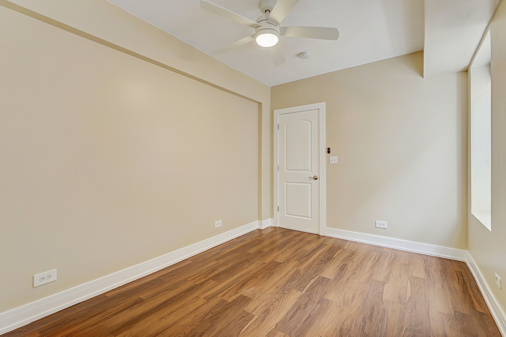 5040 West Berenice Avenue, Unit 1 Chicago, IL 60641 - Photo 15 of 18 wooden floor in an empty room