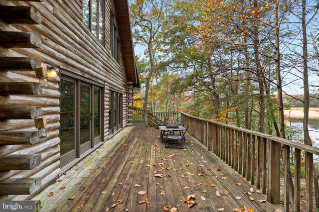 a view of a chairs and table in the patio
