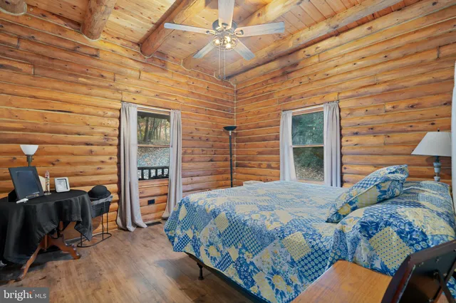 a view of a chairs and table in the balcony