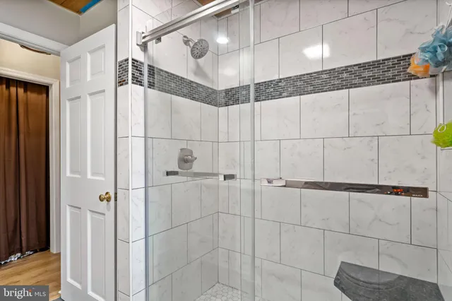 a view of entryway with wooden floor