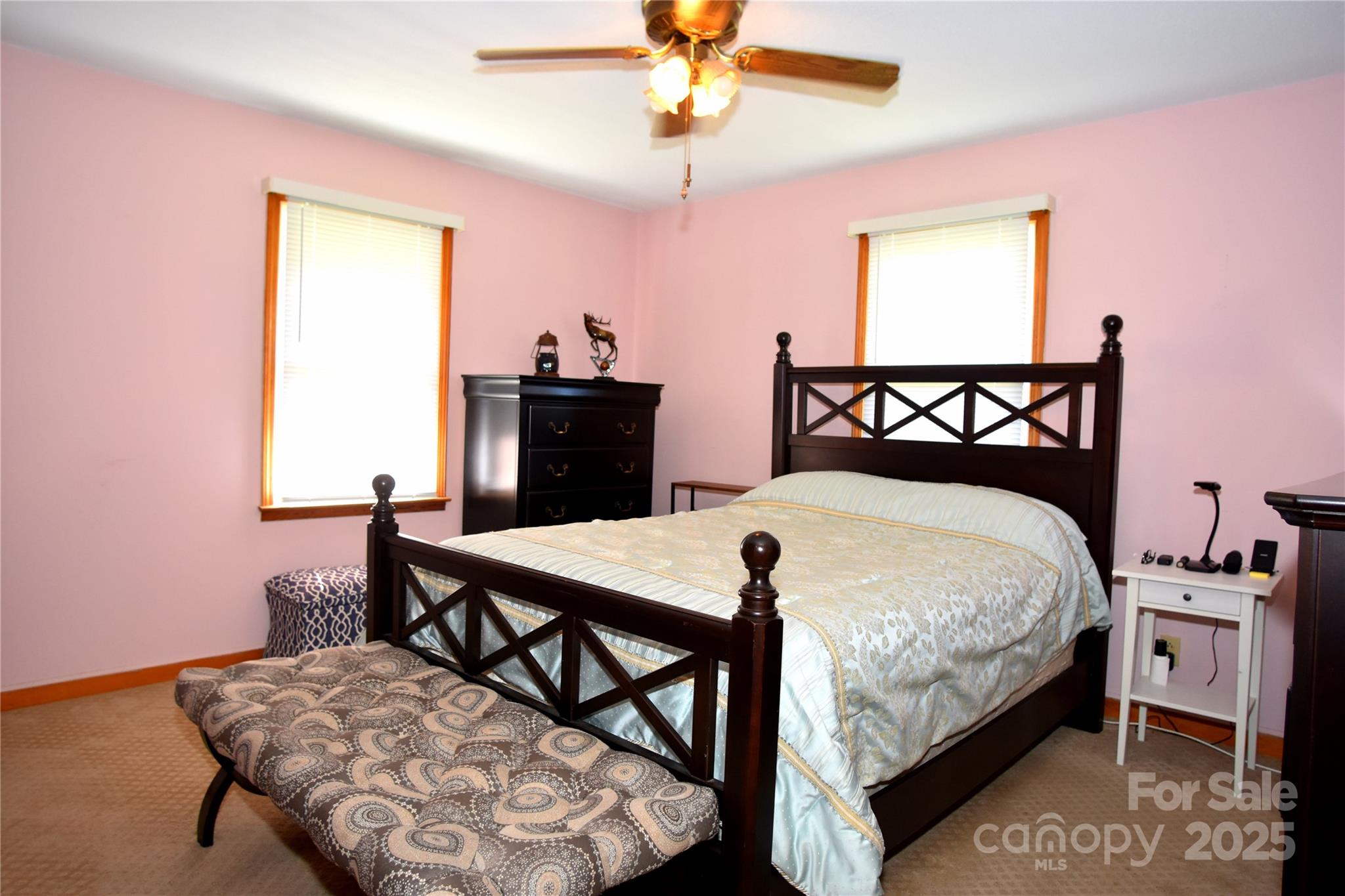 802 Linden Drive Chester, SC 29706 - Photo 12 of 47 a bedroom with a bed and a table in it