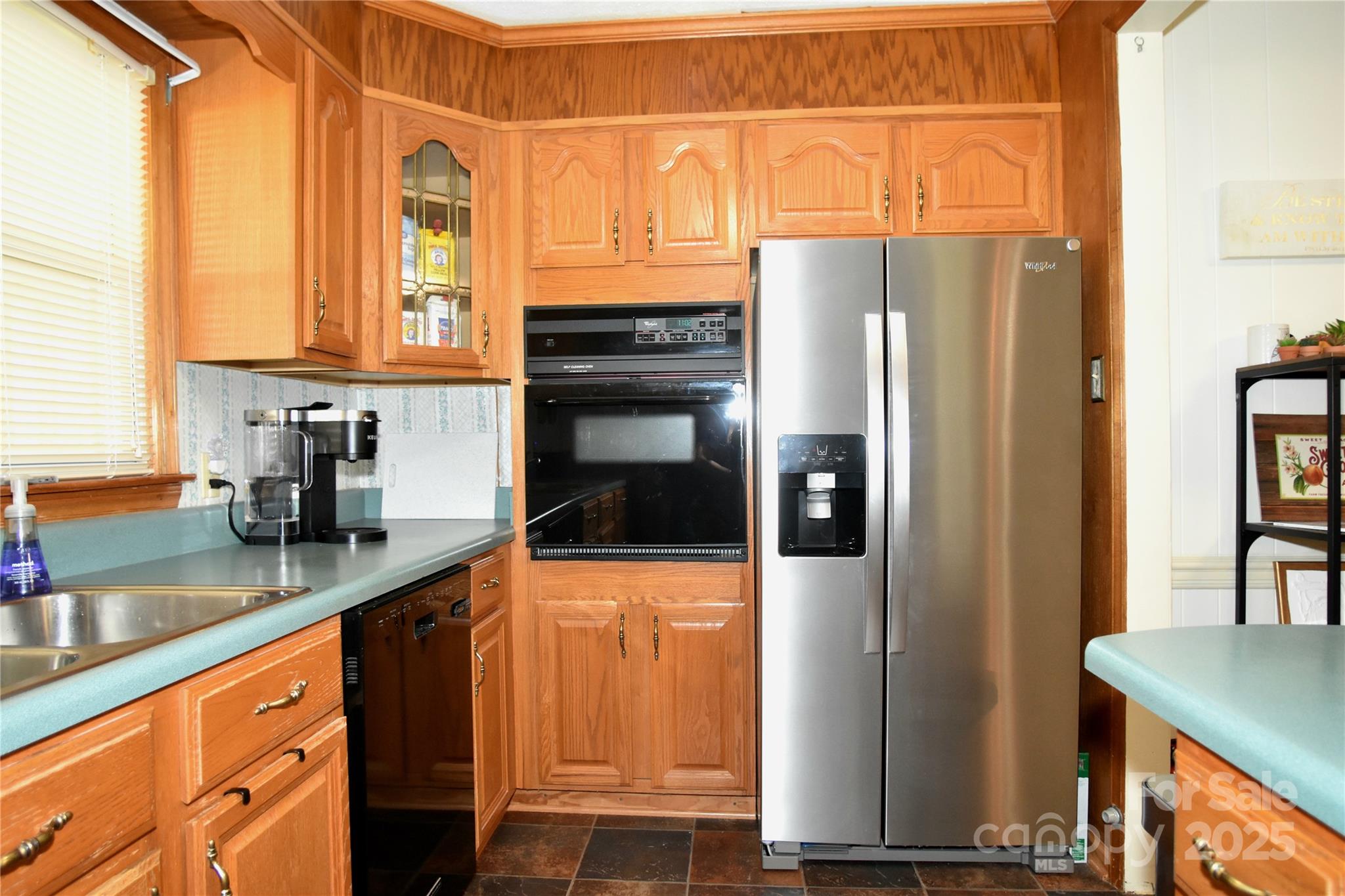 802 Linden Drive Chester, SC 29706 - Photo 21 of 47 a kitchen with stainless steel appliances a refrigerator and a sink