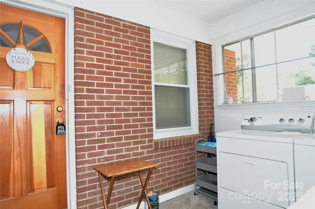 a bathroom with a sink and a window