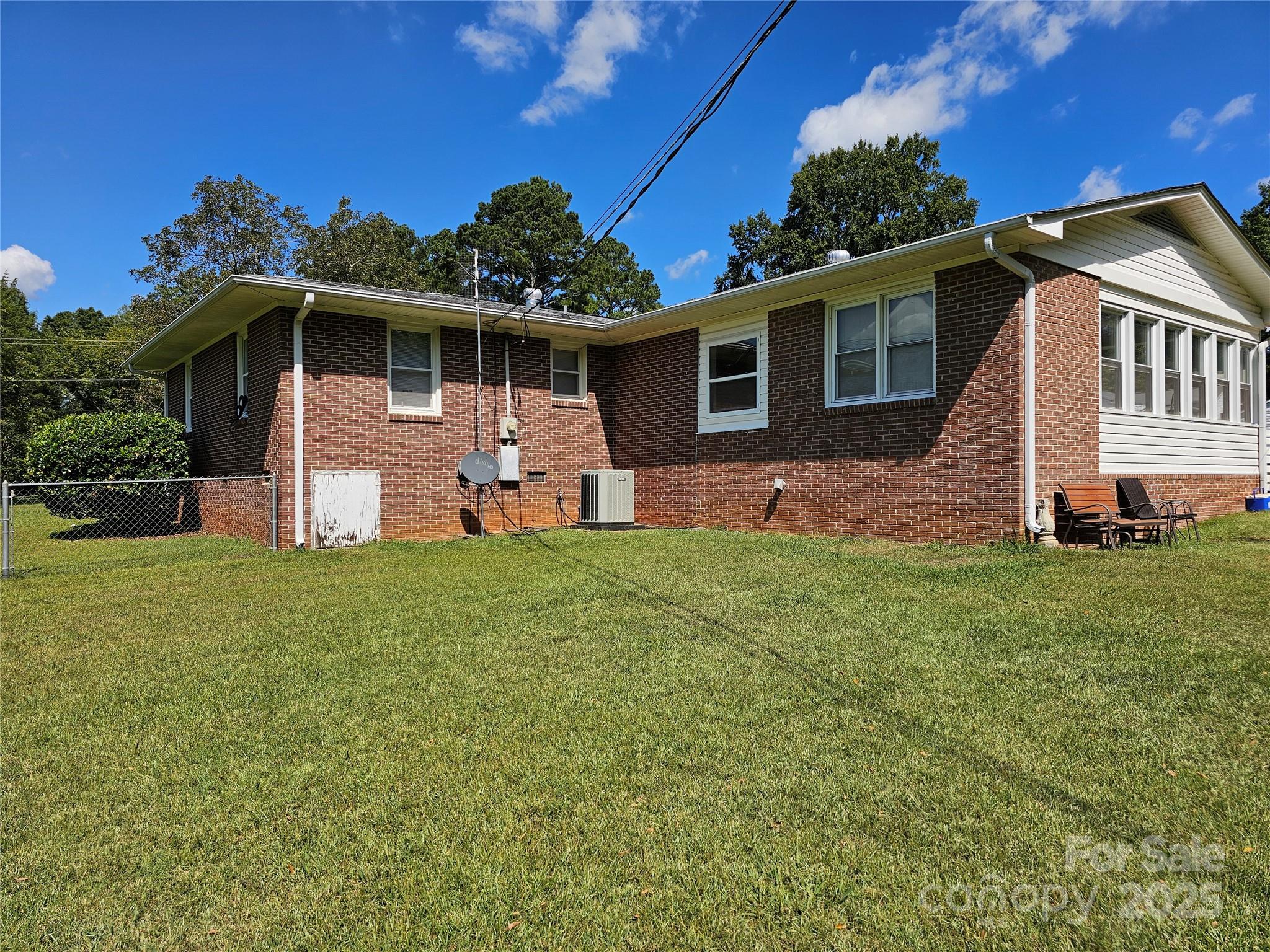 802 Linden Drive Chester, SC 29706 - Photo 33 of 47 a front view of a house with a yard and garage
