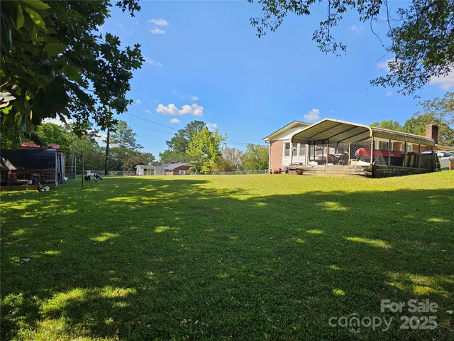 a view of a house with a garden