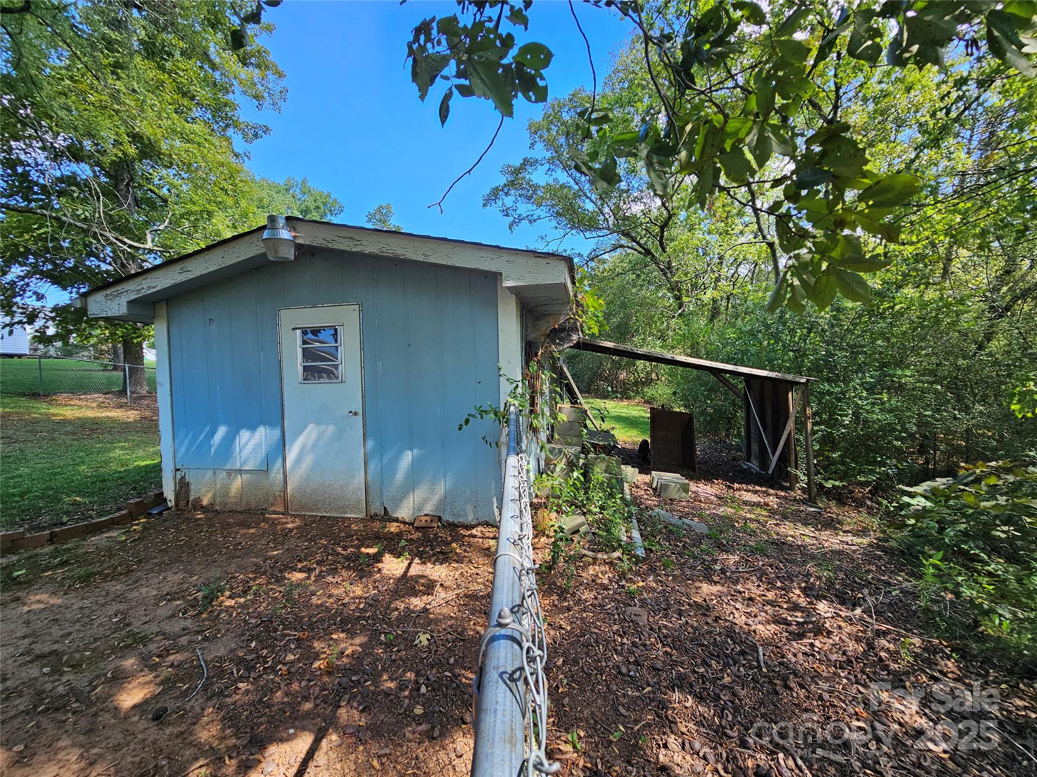 802 Linden Drive Chester, SC 29706 - Photo 38 of 47 a backyard of a house with lots of green space