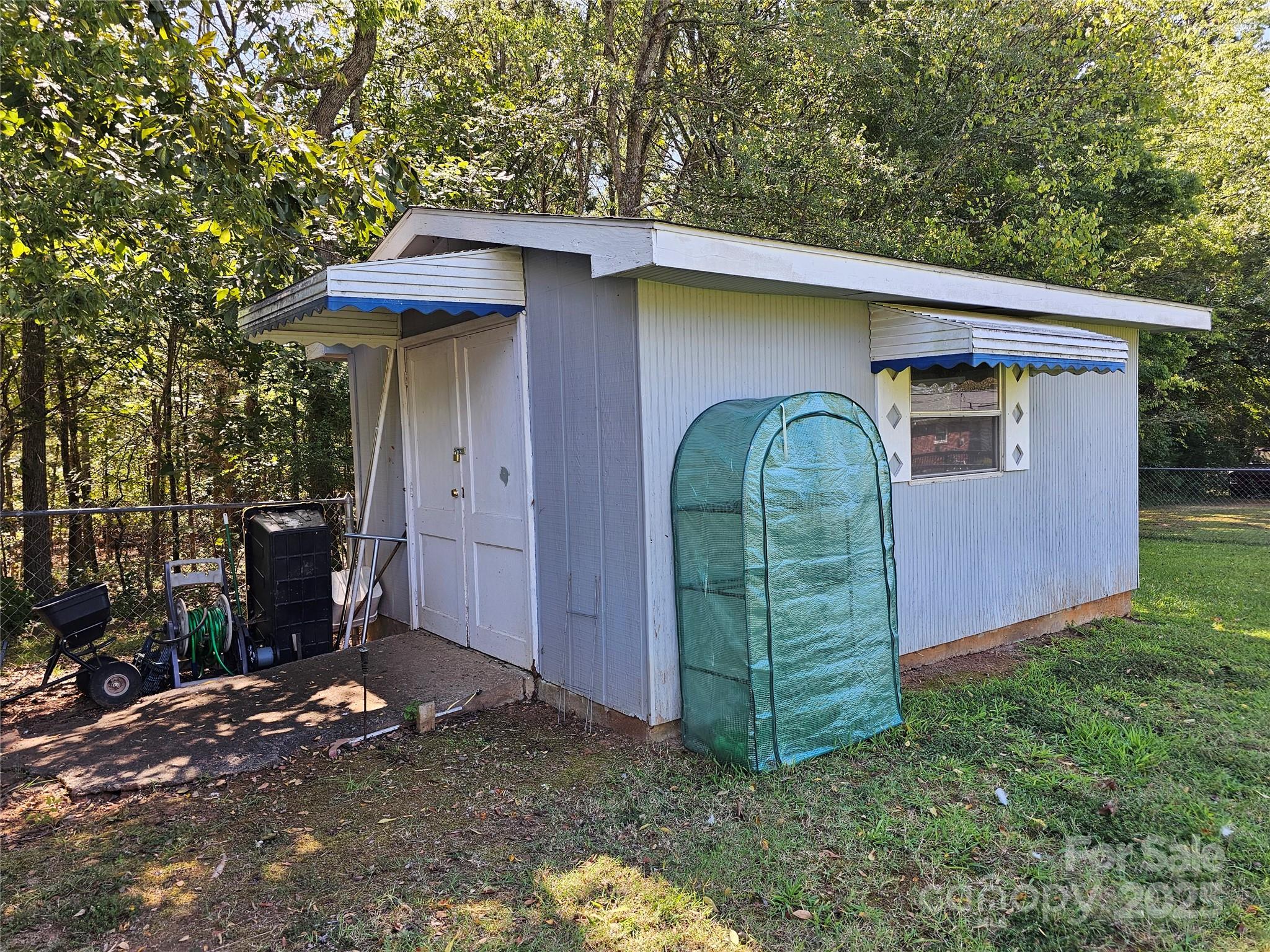 802 Linden Drive Chester, SC 29706 - Photo 46 of 47 a view of a wooden house with a yard