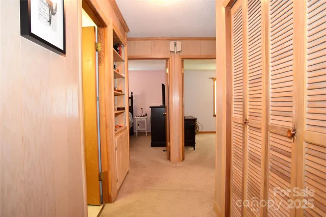 a view of a bathroom with a shower and a sink