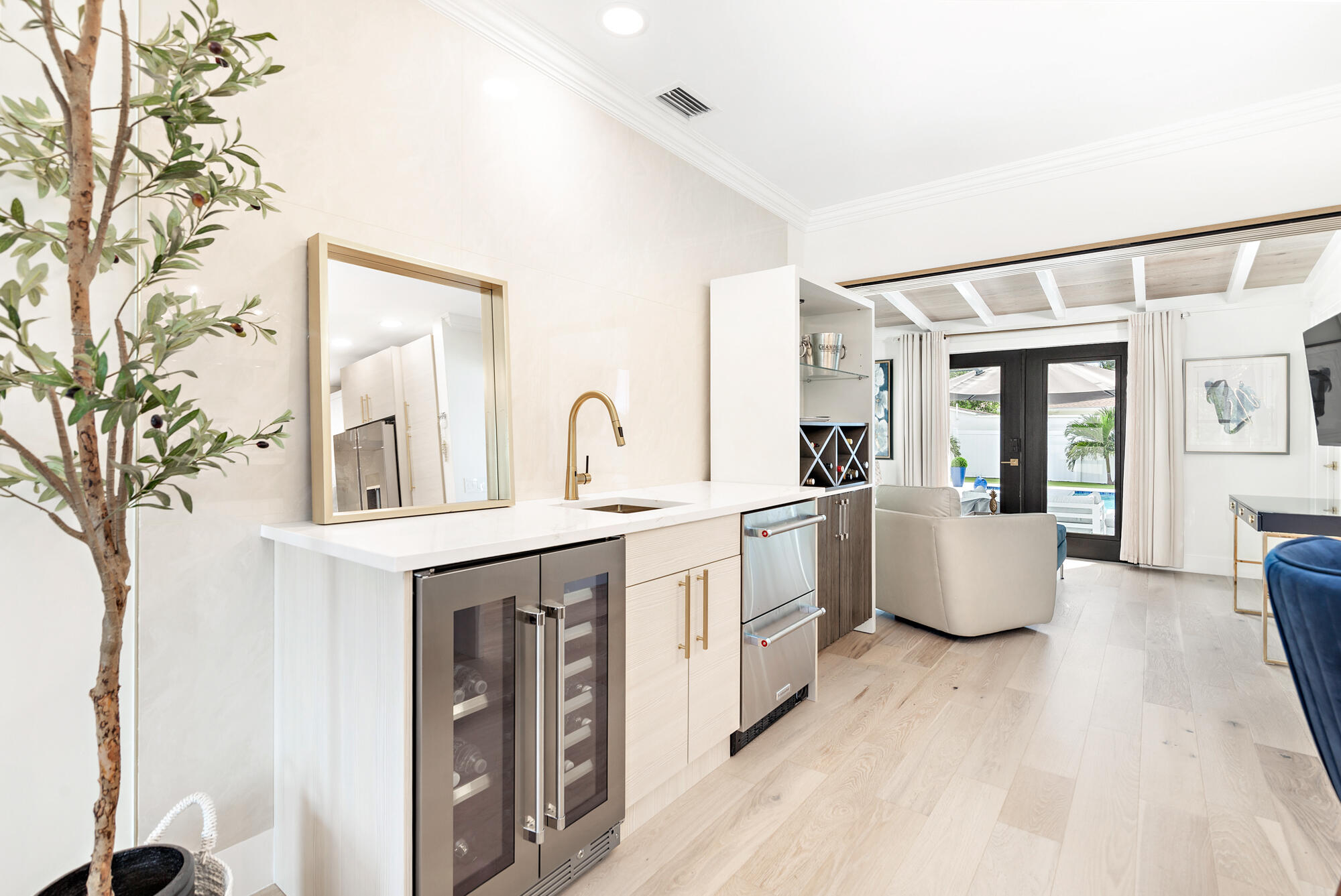 340 Ellamar Road West Palm Beach, FL 33405 - Photo 13 of 33 Wet bar with wine fridge