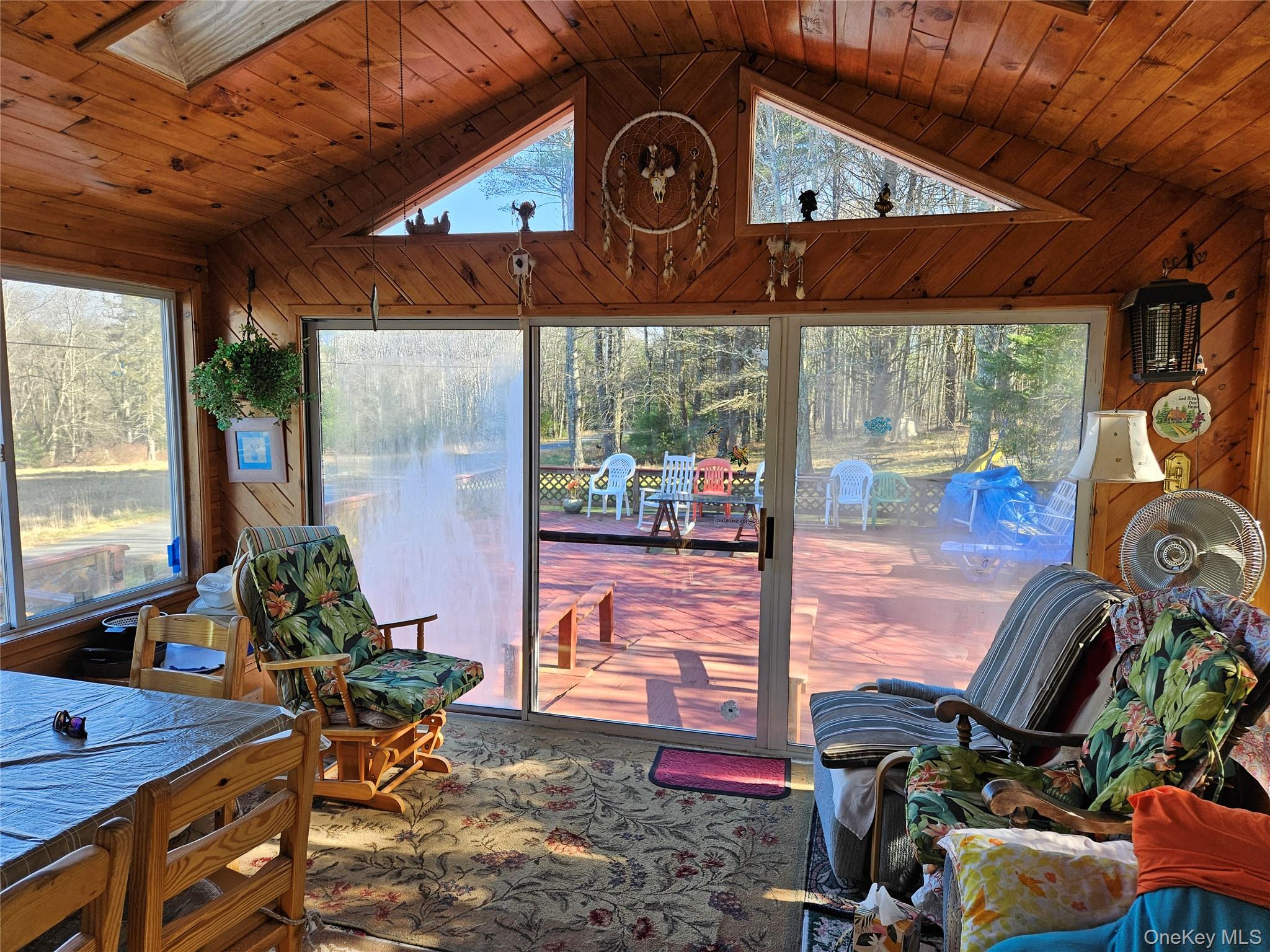 3624 State Rte 55 Kauneonga Lake, NY 12749 - Photo 38 of 48 Sunroom featuring lofted ceiling and a skylight