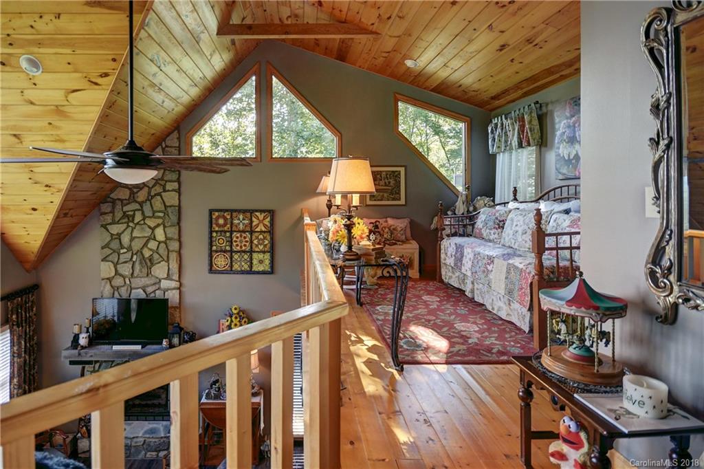 204 Kings Ridge Road Maggie Valley, NC 28751 - Photo 15 of 34 a view of a porch with furniture