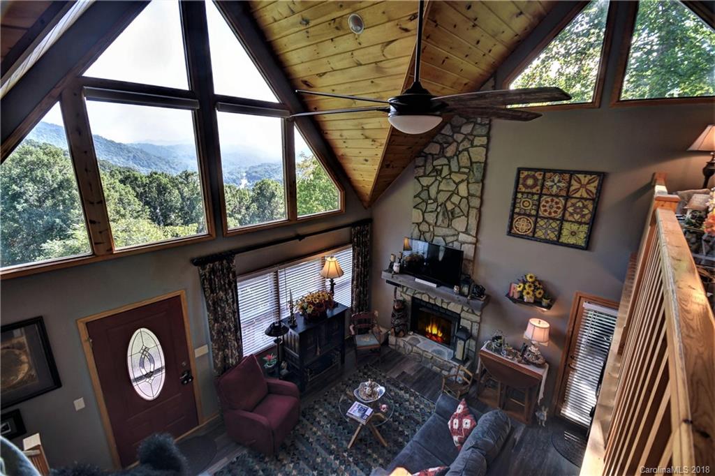 204 Kings Ridge Road Maggie Valley, NC 28751 - Photo 17 of 34 a living room with furniture and a window