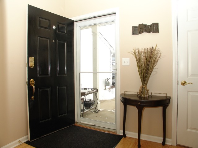 2408 Golf Ridge Circle Naperville, IL 60563 - Photo 2 of 25 a view of a hallway with a view of living room