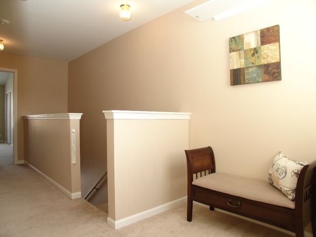 2408 Golf Ridge Circle Naperville, IL 60563 - Photo 11 of 25 a living room with furniture and a table