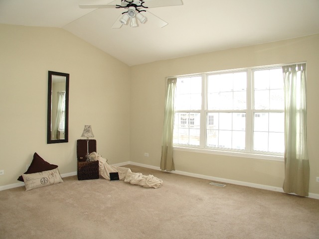 2408 Golf Ridge Circle Naperville, IL 60563 - Photo 12 of 25 a view of an empty room with a window