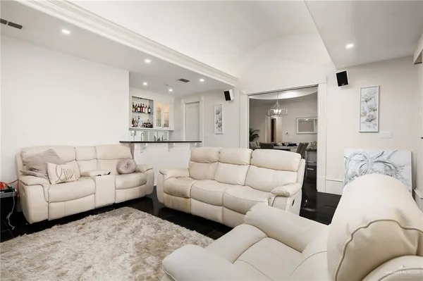 a living room with furniture and a couch