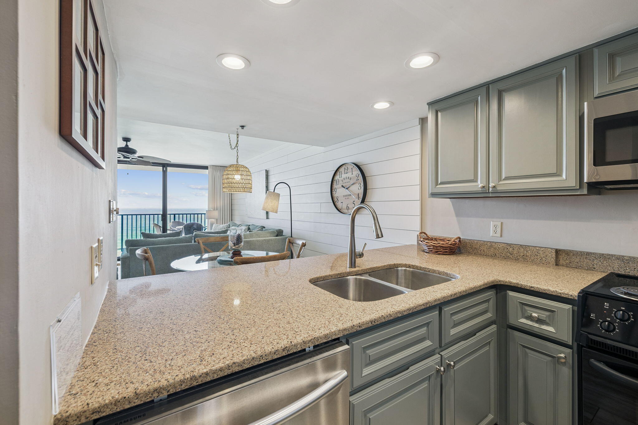 4100 East County Highway 30A, Unit 1004 Santa Rosa Beach, FL 32459 - Photo 13 of 48 a kitchen with sink and cabinets