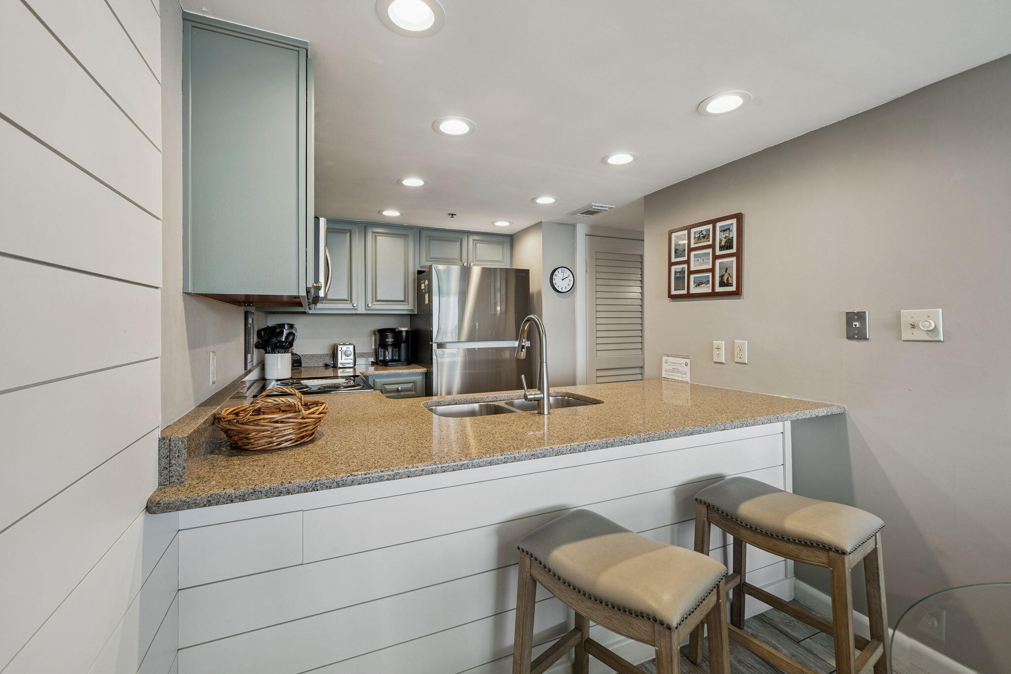 4100 East County Highway 30A, Unit 1004 Santa Rosa Beach, FL 32459 - Photo 15 of 48 a kitchen with a sink cabinets and wooden floor