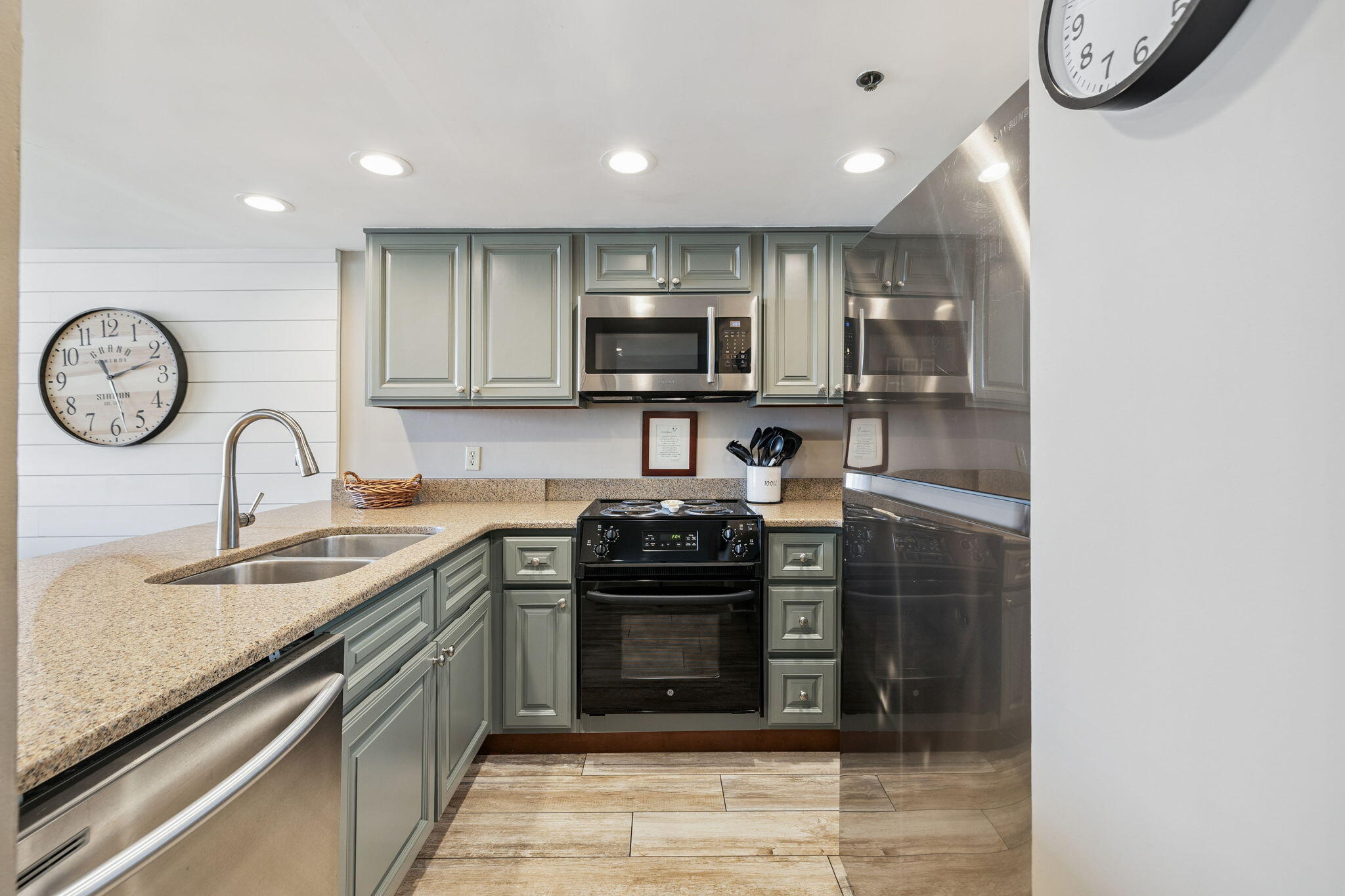 4100 East County Highway 30A, Unit 1004 Santa Rosa Beach, FL 32459 - Photo 17 of 48 a kitchen with stainless steel appliances granite countertop a sink stove and cabinets