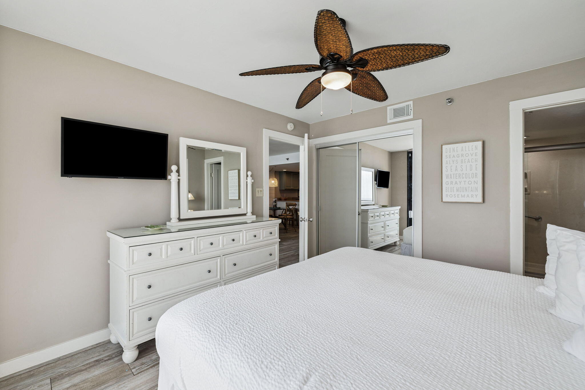 4100 East County Highway 30A, Unit 1004 Santa Rosa Beach, FL 32459 - Photo 25 of 48 a bedroom with a bed and a flat screen tv
